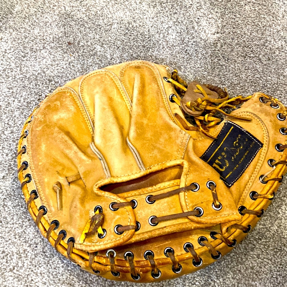 70 year old Wilson snap action catchers glove